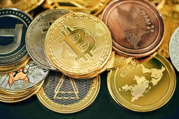 golden coins with bitcoin featured in the middle