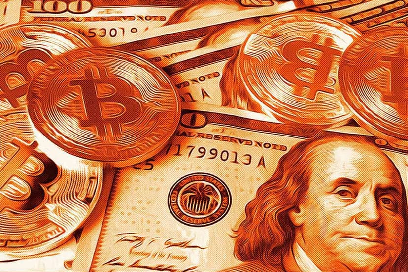 bitcoin on top of dollar bills