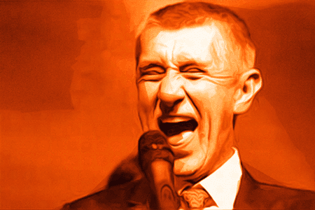billionaire Andrej Babis grimaces in front of microphone